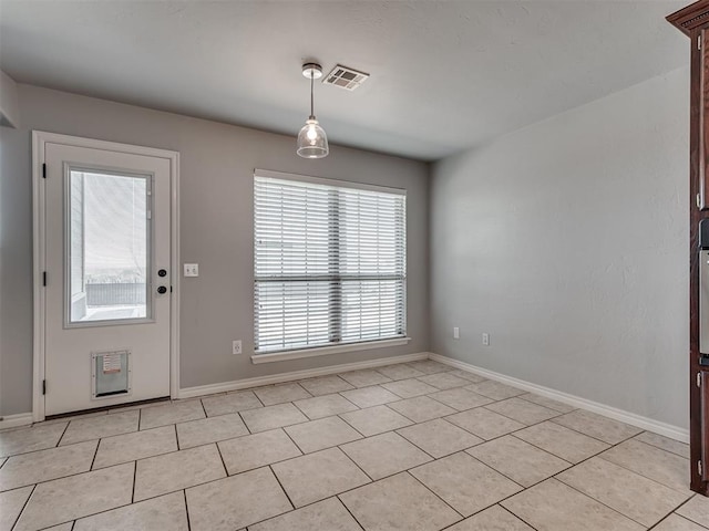 interior space with light tile patterned flooring