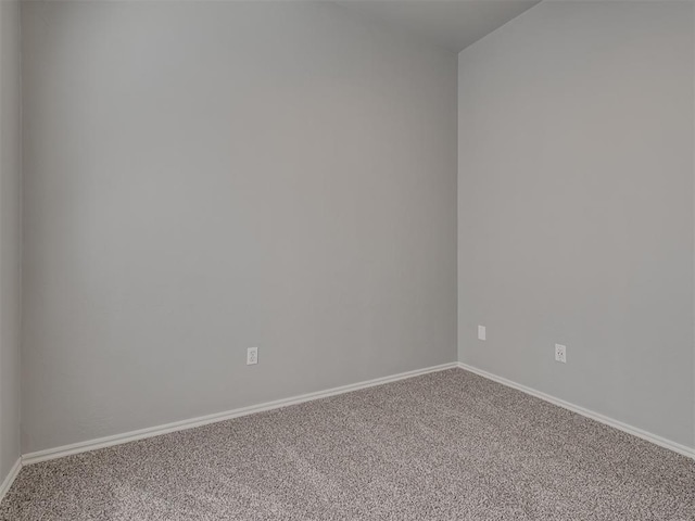 spare room featuring carpet flooring