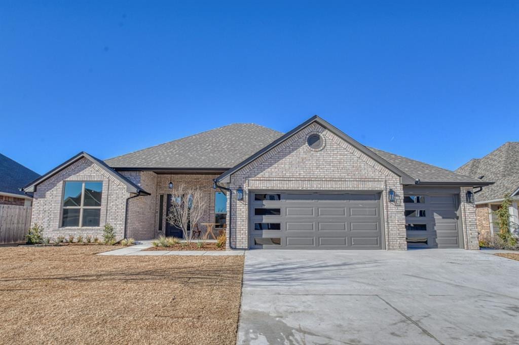 view of front of property with a garage