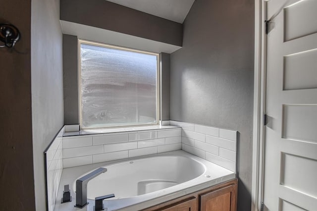 bathroom featuring a washtub