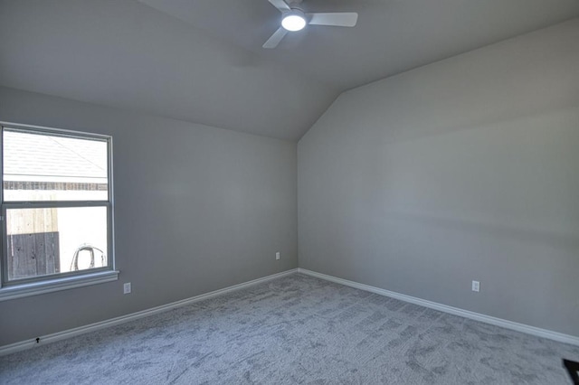 bonus room with ceiling fan, light colored carpet, and lofted ceiling