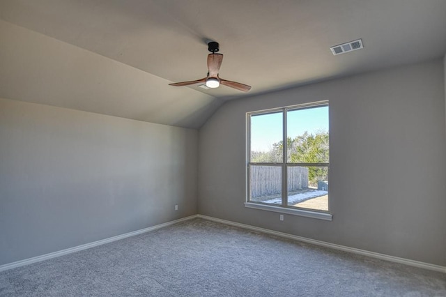 additional living space with vaulted ceiling, ceiling fan, and carpet floors