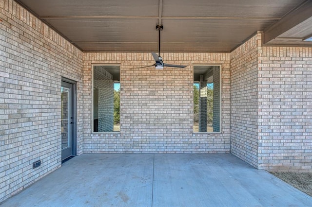 view of patio with ceiling fan