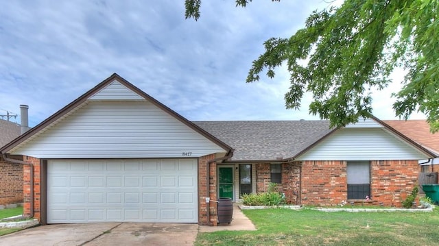 ranch-style home featuring a front yard and a garage