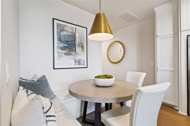 dining area featuring light hardwood / wood-style flooring