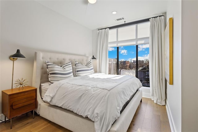 bedroom featuring wood-type flooring