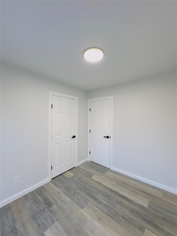 spare room featuring light hardwood / wood-style floors