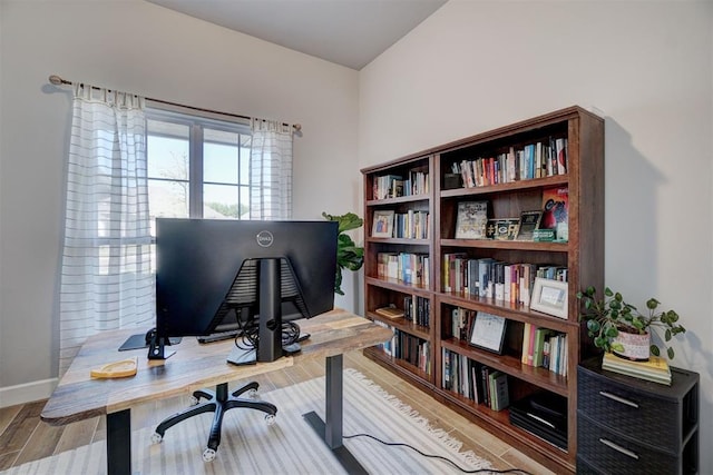 office area with light wood-type flooring