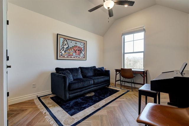 living room featuring ceiling fan, lofted ceiling, and light parquet floors