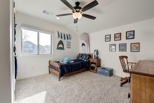 carpeted bedroom with ceiling fan and lofted ceiling