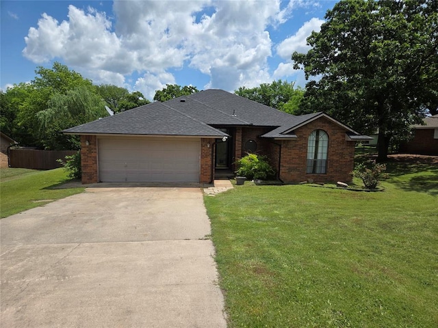 812 S Jessica Way, Pauls Valley, OK 73075 - single story home with driveway, a garage, brick siding, and roof with shingles