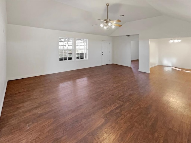 unfurnished living room featuring vaulted ceiling, ceiling fan, and dark hardwood / wood-style flooring