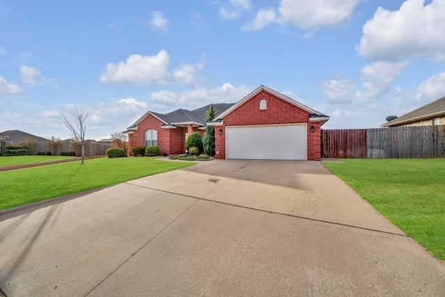 single story home with a garage and a front yard