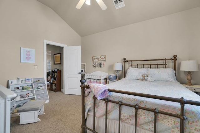 carpeted bedroom with vaulted ceiling and ceiling fan