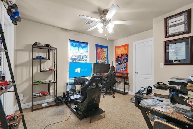 office area with light colored carpet and ceiling fan