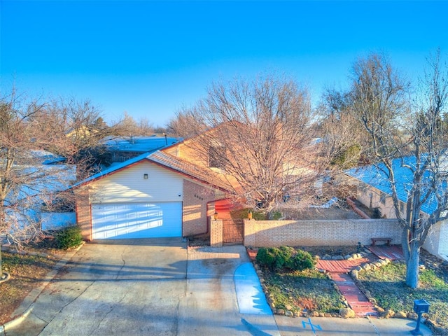 view of front of property featuring a garage