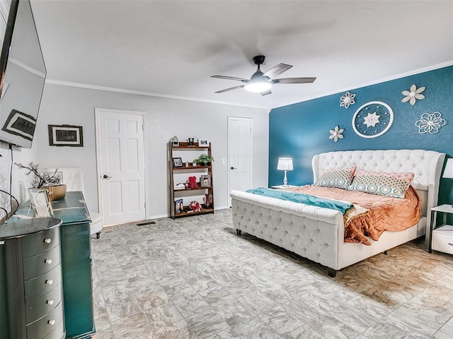 bedroom featuring ceiling fan and crown molding