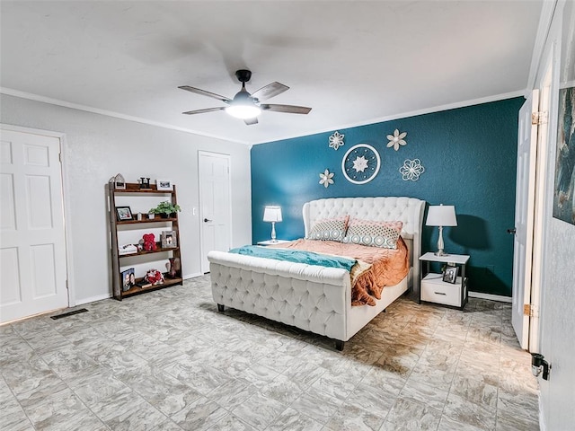 bedroom featuring ceiling fan and crown molding