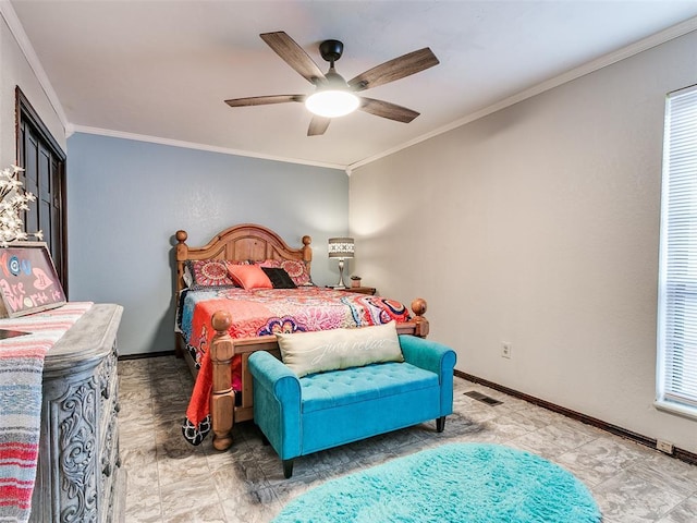 bedroom with ceiling fan and crown molding