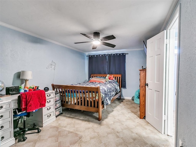 bedroom with ceiling fan and crown molding