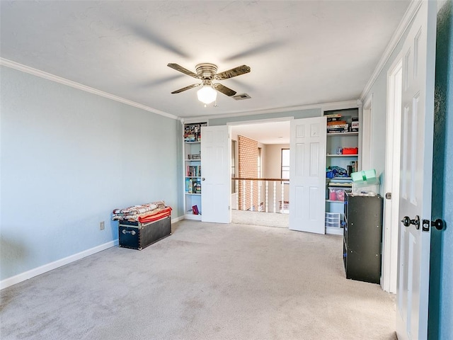 interior space featuring light carpet, ceiling fan, and ornamental molding