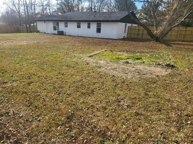 view of yard featuring central AC