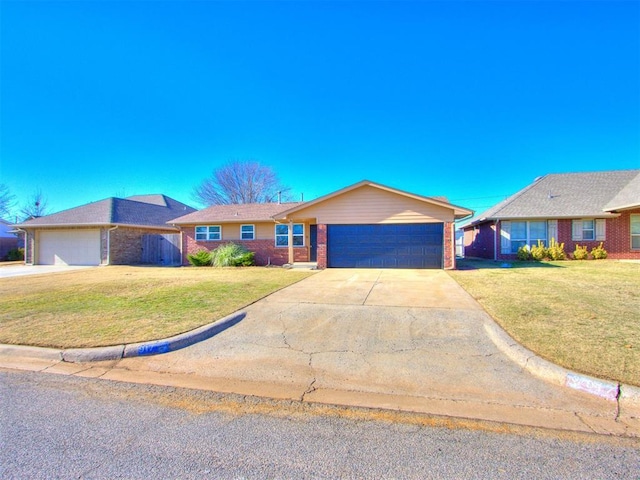 ranch-style home featuring a garage and a front yard