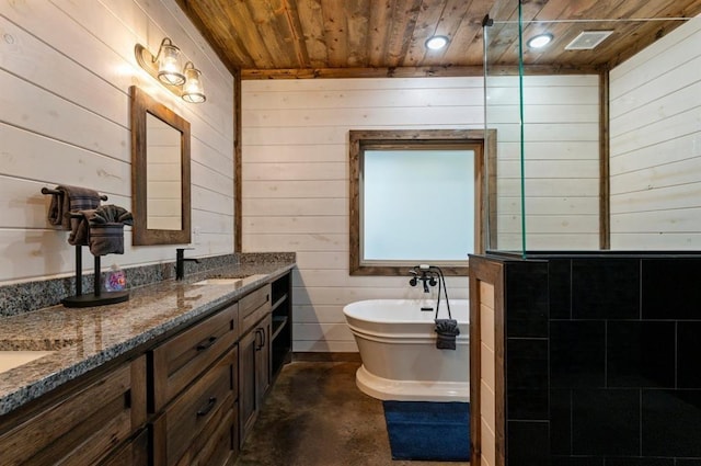 bathroom featuring a washtub, concrete flooring, wood walls, wooden ceiling, and vanity