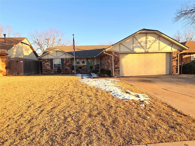 ranch-style home featuring a garage