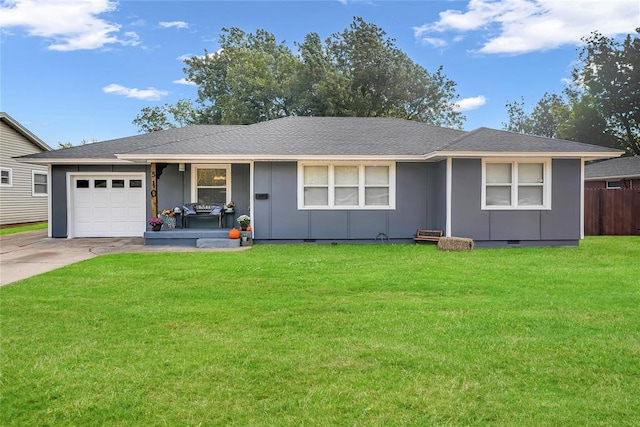 ranch-style home featuring a front yard, a garage, and a porch