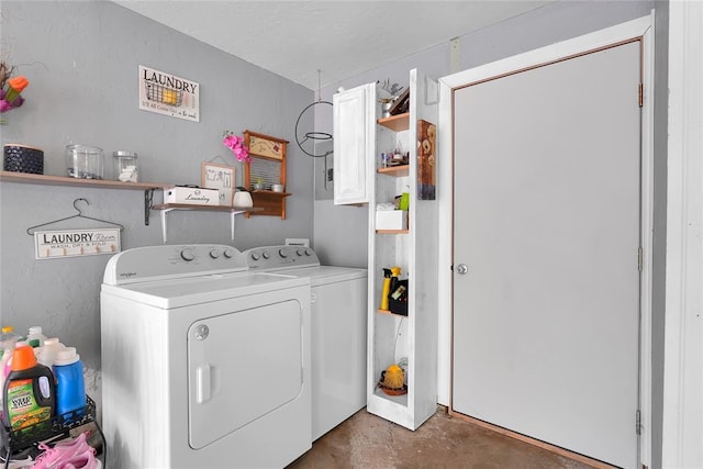 laundry area featuring washing machine and dryer