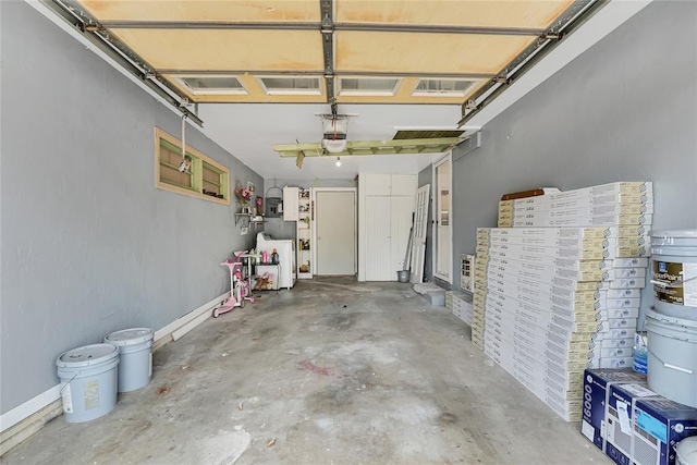 garage featuring a garage door opener