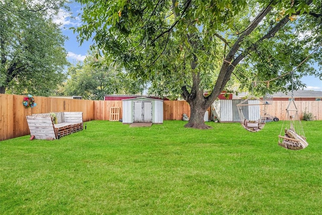 view of yard with a storage shed