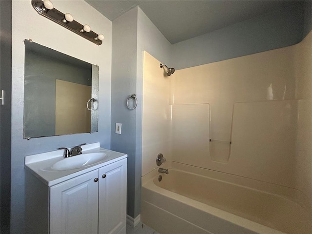 bathroom featuring shower / tub combination and vanity