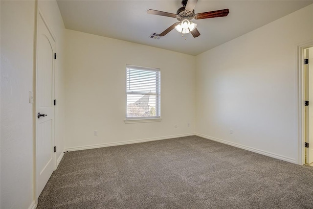 carpeted empty room with ceiling fan