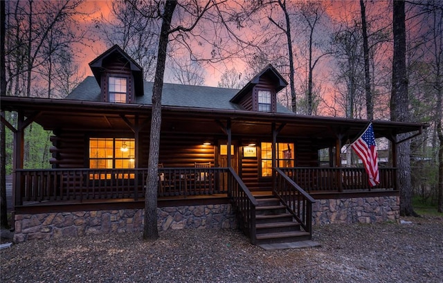 log home with a porch