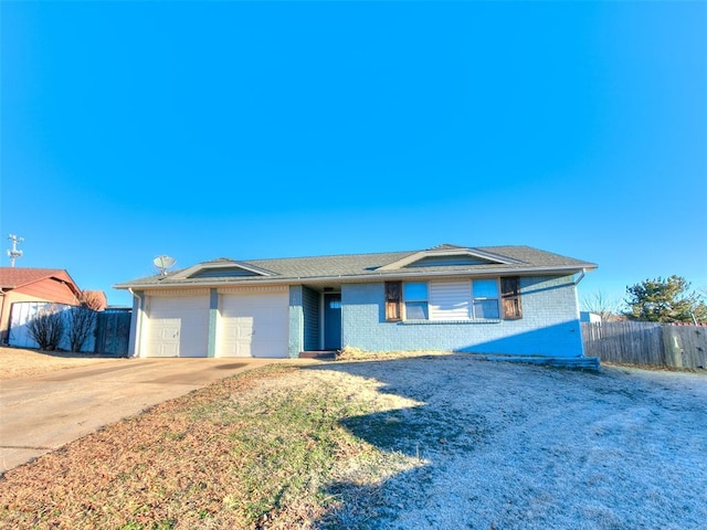 single story home with a garage