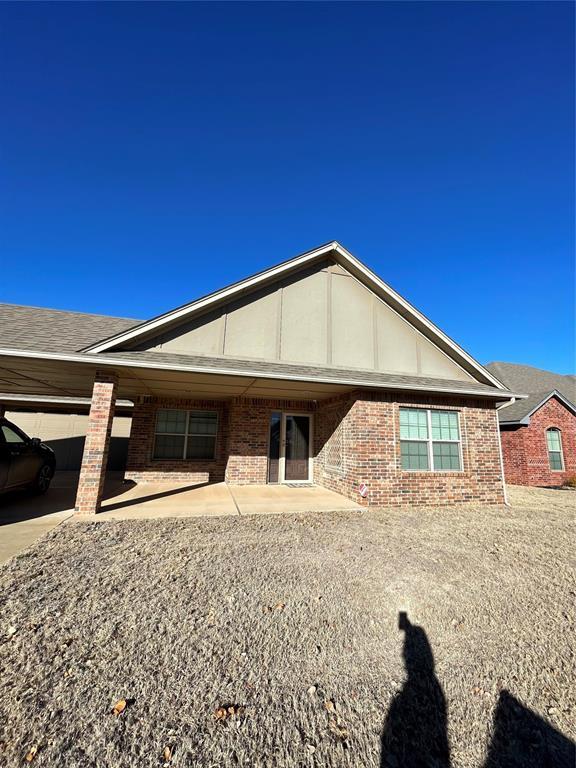 rear view of house featuring a patio