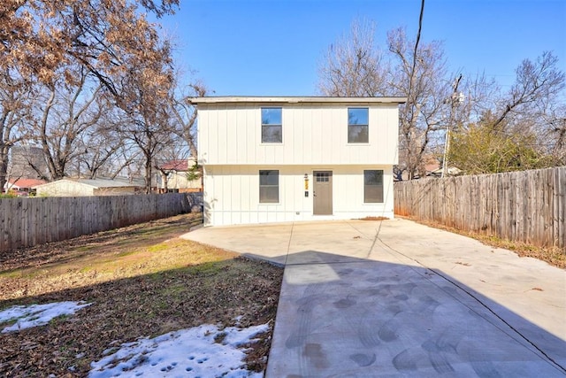 rear view of house with a patio