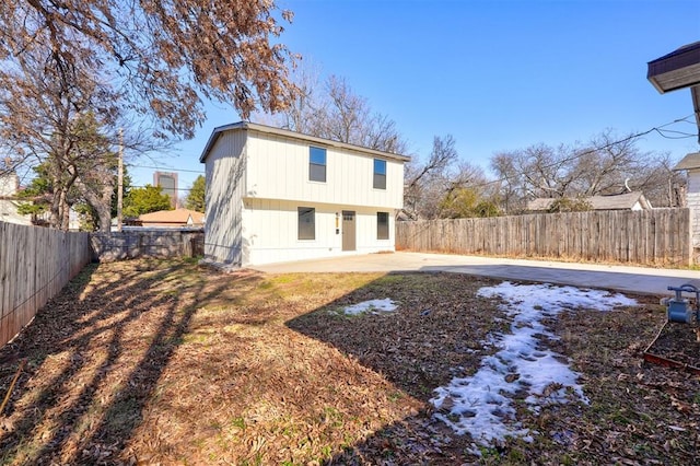 rear view of house with a patio