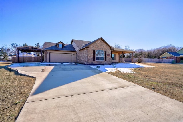 view of front of house with a front lawn and a garage