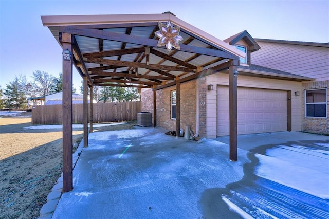 view of parking / parking lot with a garage