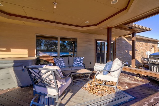 wooden deck featuring outdoor lounge area