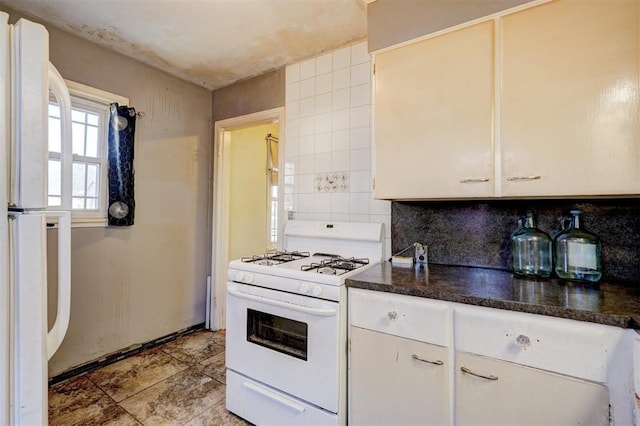 kitchen featuring white cabinets, backsplash, and white appliances