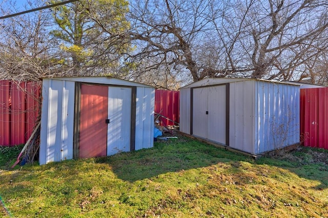 view of outdoor structure featuring a lawn