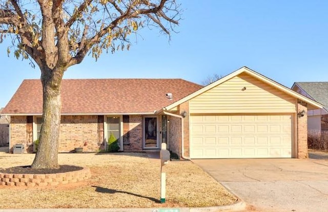 single story home with a garage