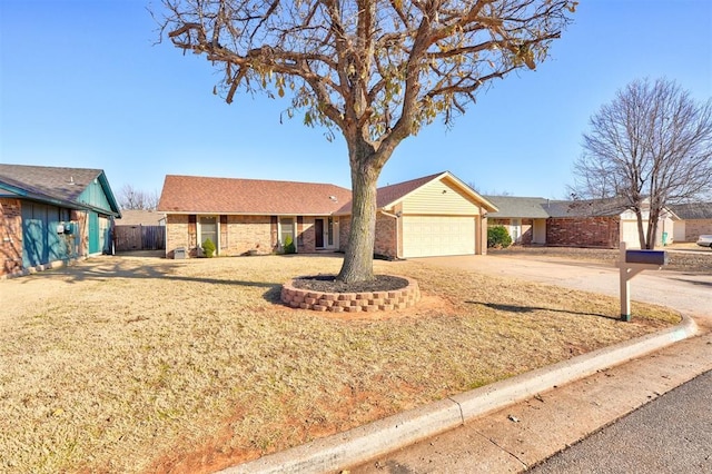 single story home featuring a garage