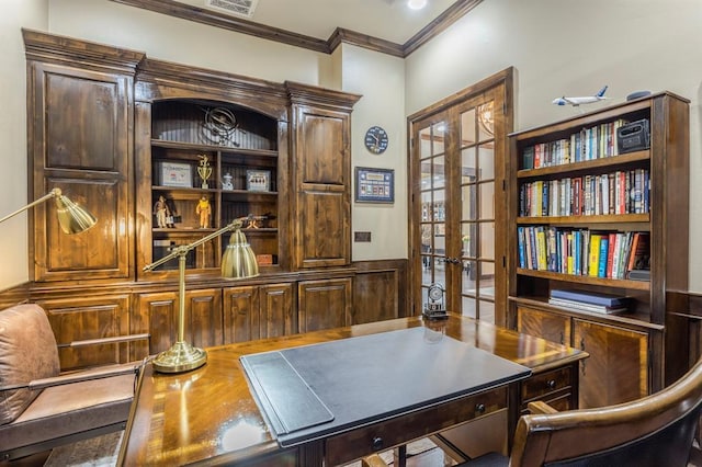 home office featuring french doors, visible vents, and crown molding