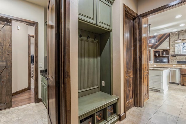 mudroom featuring baseboards and recessed lighting