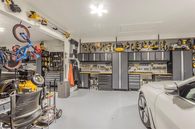 garage with a workshop area